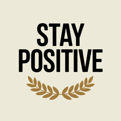 Motivational typography design stay positive message with laurel wreath accent for inspirational posters and uplifting content vector