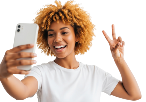 Young woman with afro hair taking a selfie with a smartphone and showing peace sign isolated on transparent background - Powered by Adobe