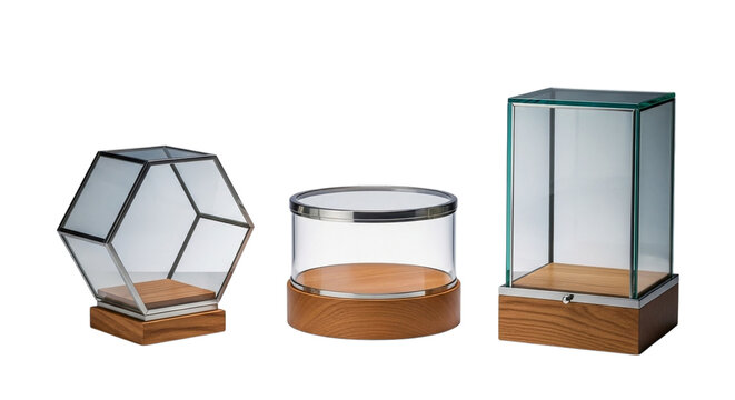 Three empty glass display cases with wooden bases isolated on transparent background