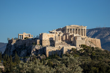 Fototapeta premium The Acropolis of Athens and the Parthenon under clear blue skies.