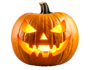 A classic carved halloween pumpkin with a scary face, glowing from within with warm l