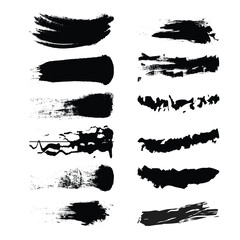 Collection of black ink brush strokes and splatters on a white background for artistic design elements