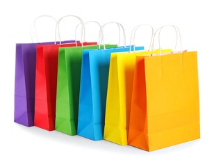 A collection of bright, colorful paper shopping bags with white handles, arranged in a row. The backgrounds are clean