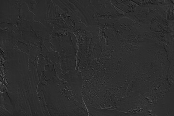Close up, macro of black painted textured stucco wall with rough plaster, concrete surface texture. Abstract background, backdrop for design, wallpaper art or decoration projects.