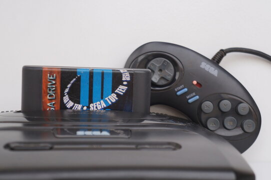 Sega Mega Drive console with Top Ten cartridge. 
