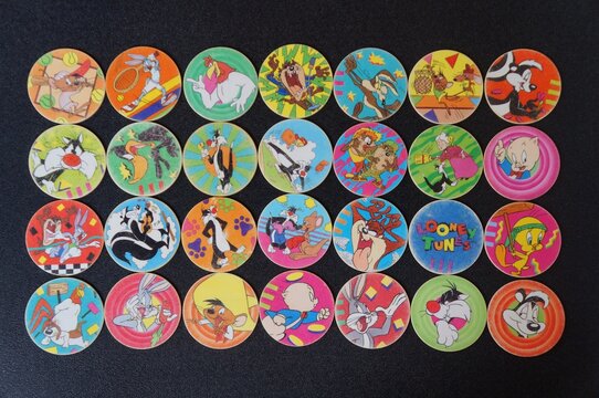 Tazos Collection on Black Background. 