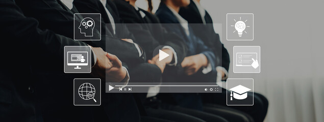 A modern business meeting showcases a diverse group of professionals discussing technology and...