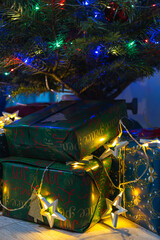 Presents under the Christmas tree. Gifts for young children.