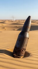 Abandoned Bullet in the Desert - A Relic of Conflict.