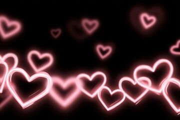 A vibrant group of pink neon hearts glowing against a dark black background, perfect for a romantic or Valentine's Day concept.