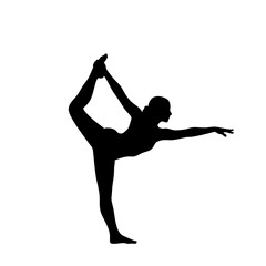 Fototapeta premium Silhouette of a woman in Lord of the Dance yoga pose, balancing with outstretched arm