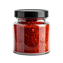 A small, clear glass jar filled with vibrant red chili flakes and a black lid