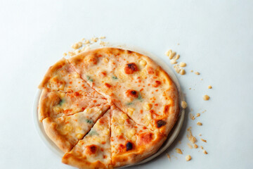 Delicious four cheese pizza with a crispy golden crust