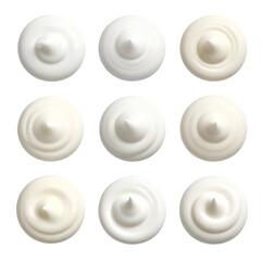 Overhead view of nine swirls of cream-like substance against black background, varied textures
