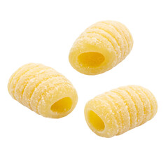 Close-up of three cylindrical, ridged pasta shapes against a black background