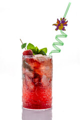 Strawberry cocktail with mint and ice on white background. Refreshing red strawberry cocktail with ice, mint leaves, and green straw in transparent glass.