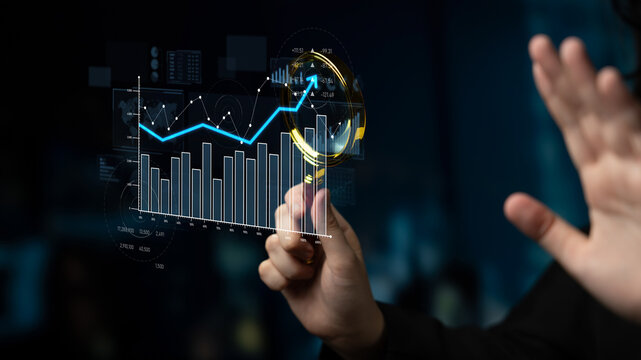 A businessman examines digital data trends using advanced technology in a modern office setting, showcasing interactive graphs and insightful analytics for strategic decisions. Scalp
