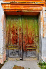 Old thick wooden door in Zrenjanin.