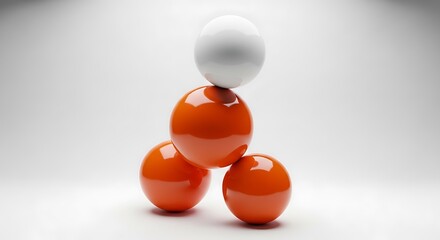 Stacked orange and white spheres on a light gray background ball
