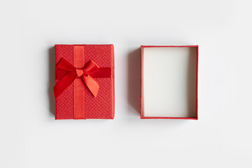 Open Red Gift Box with Lid on White Background Top View