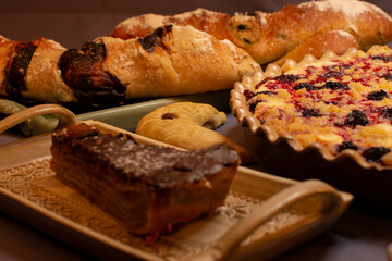 Beautifully arranged baked goods like bread, cake, and pastries are delicious and aesthetically pleasing