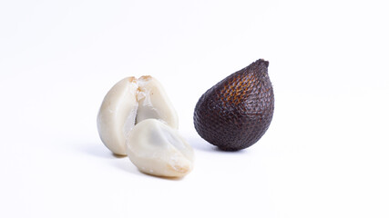 Whole and sectioned salak or snake fruit isolated on white. Tropical Indonesian fruit showing flesh, symbolizing healthy eating, exotic food, and sweet natural snack.
