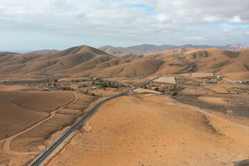 Aerial View of a Winding Mountain Road in Sicasumbre, Fuerteventura