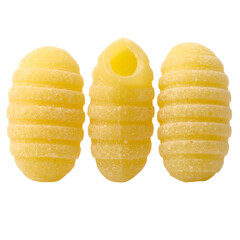 Three ridged, oval pasta shapes are isolated on a black background, offering a close-up view