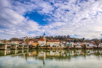 Obraz premium Panoramic view of Passau Innstadt Bavaria Germany with colorful houses and church reflected in the river Inn