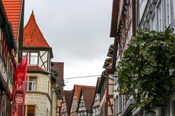 View of the roofs of old German half-timbered houses along a street