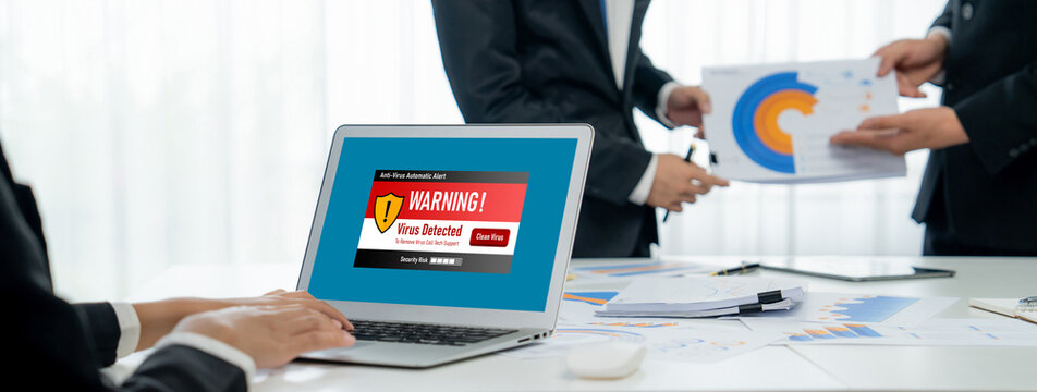 Virus warning alert on computer screen detected brisk cyber threat , hacker, computer virus and malware