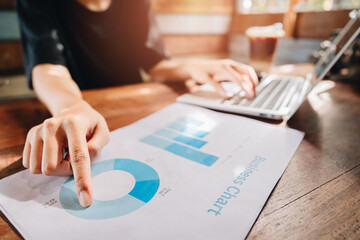 Analytics concept. Business Analytics Process with Charts and Laptop for Data Analysis and Decision Making in Modern Office Environment