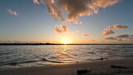 Luxury resort photo of Bora Bora tropical paradise island with sandy beach on sunrise. Photography...
