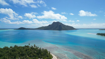 Luxury resort photo of Bora Bora tropical paradise islands
with palm trees. Aerial 
perspective...
