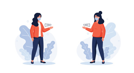 Two people in masks maintaining distance from each other.