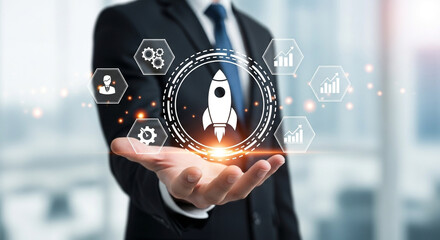 Professional businessman launches innovative startup concept with digital rocket and growth icons, symbolizing ambition and success in modern business