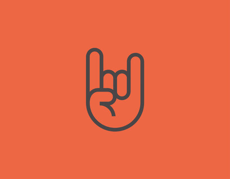This image presents a stylized rock hand gesture, ideal for representing music, passion, and individuality, accentuating the vibrant subculture surrounding rock and roll.