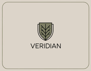 This elegant logo showcases a shield with a tree, representing growth, strength, and sustainability, crafted with clean lines and a professional aesthetic.