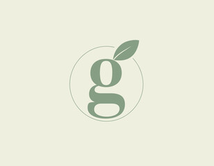 A sophisticated logo featuring the letter g adorned with a leaf, symbolizing growth and sustainability, delicately designed in soft colors to evoke nature.