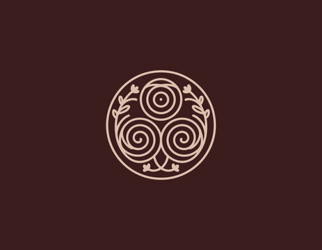 An elegant circular emblem showcasing intricate swirls and patterns, ideal for businesses focusing on art, organic products, wellness, or crafts that value tradition.