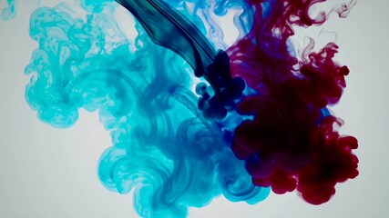 Vibrant blue and red ink clouds swirling gracefully in water
- Powered by Adobe