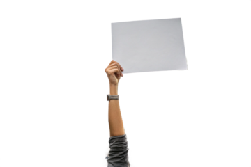 se-up of a hand holding up white paper. Cutout. Transparent. Message. Protest. Demonstration. Opinion. Statement.