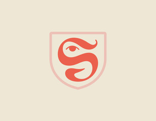 Fototapeta premium This logo showcases an elegant shield design with an artistic 'S', representing strength and protection while embodying sophistication and creativity.