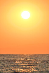 Golden sunrise over the sea in Paralia, Katerini, Greece.