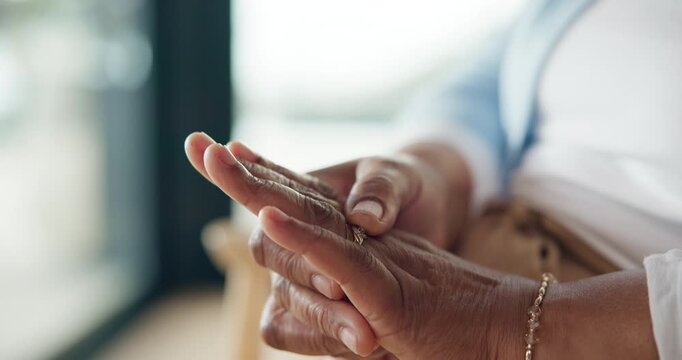 Divorce, hands of woman or wedding ring in home with marriage doubt, infidelity or enough of betrayal. Separation, person and fidget with jewelry on sofa for relationship regret and cheating affair