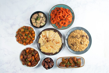 South Asian Iftar Feast Full Dinner Spread with Biryani, Curry, Paratha, Jalebi, Medjool Dates,...