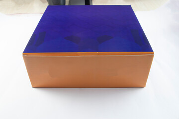 Two-Tone Packaging Box: Closed Blue and Orange Gift Container Mockup isolated on white background top view