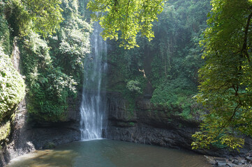 This waterfall offers an exotic, unspoiled view, located in the middle of the mountain forests of Cimahi City, West Java, Indonesia.
