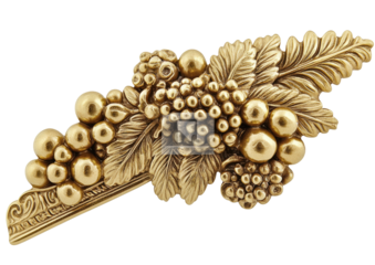Gold, ornate relief of grapes and leaves on dark background