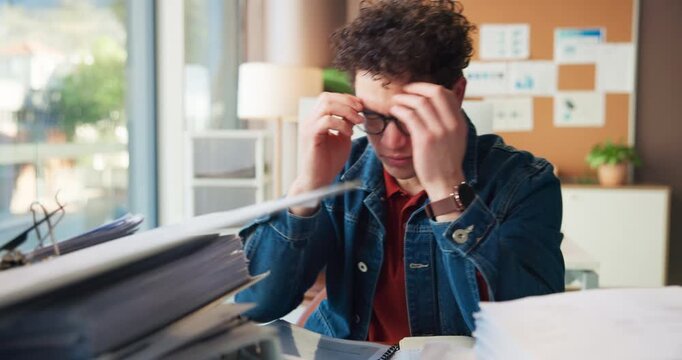 Mental health, documents and man in office with pile, admin crisis or frustrated in task management. Stress, burnout or employee in workplace with paperwork, pressure or anxiety for report deadline.
